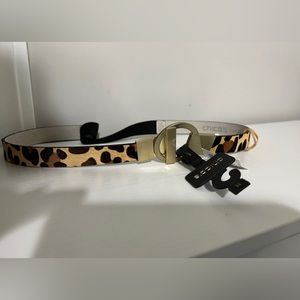 Chico’s 3 size stretch leather calf hair animal print belt with metal fastener.